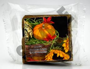 A package of food with a picture of pumpkins and sunflowers

Description automatically generated