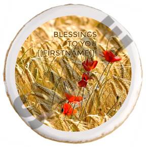 A round cookie with a white border and red flowers

Description automatically generated