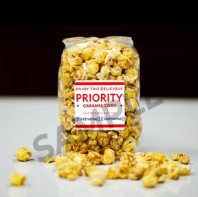 A bag of popcorn on a table

Description automatically generated